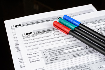 Obraz premium Form 1040 Individual Income Tax return form. United States Tax forms 2016/2017. American blank tax forms. Tax time.