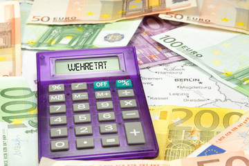 Euro Geldscheine, Taschenrechner und Wehretat in Deutschland