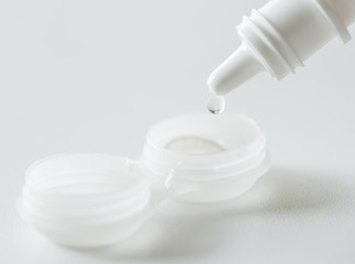 Closeup of contact lens daily cleaning routine concept