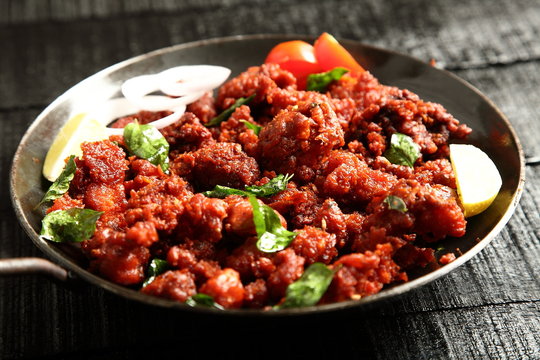 Delicious Indian chicken fried with spices and herbs,