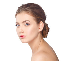 Young beautiful woman face portrait with healthy skin.