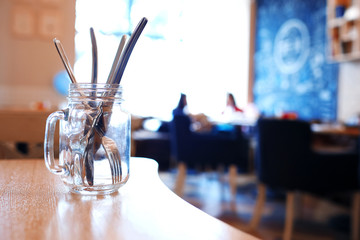 Cutlery in a glass jar