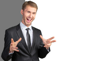 Frustrated handsome young businessman