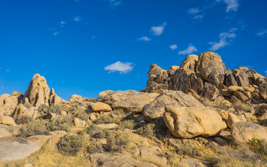 Mojave Desert in southern California holds a pile of boulders deep in the baked wilderness.
