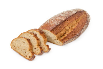 Partly sliced brown bread with the whole sprouted wheat grains