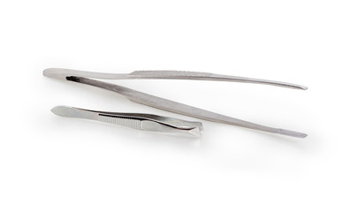 Two various steel tweezers on a white background