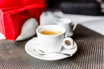 Empty cup of coffee on the wooden table