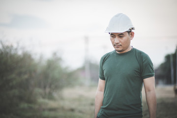 Worker or Enginerring in a green uniform prepare hard work.
