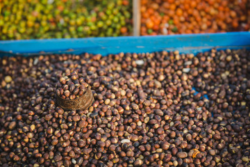 Street Food ,fried Soybean,Corn,Nuts etc with mesurement pot in the street of Nepal.