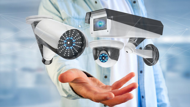 Businessman holding a Security camera system and network connection - 3d rendering