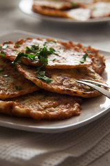 Vegetable pancakes on a white plate