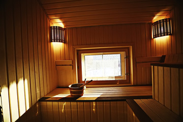sauna, wooden interior baths, wooden benches and loungers accessories for sauna, spa complex in the...