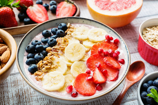 Acai Smoothie Bowl With Banana, Strawberry, Blueberry And Granola. Concept Of Healthy Lifestyle, Dieting, Weight Loss