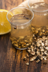 Teaglass with yellowhead root tea