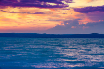Stormy rainy weather at sunset on the sea.  Balaton lake, Hungary