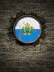 Old San Marino flag in brick wall