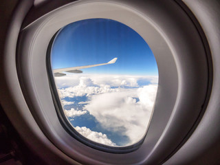 View through the porthole of aircraft. 