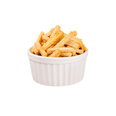 Ruddy sliced wheat bread sticks as croutons in white ceramics bowl isolated on white background. Fast food template for menu, advertising, cover.