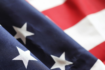 Fototapeta premium American flag on a wooden texture table