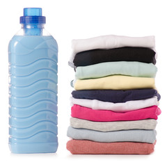 Stack of clothes Liquid powder conditioner fabric softener in hand