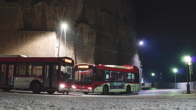 Busy bus stop at night timelapse, Sorrento, Meta, Italy, traffic, transpotation concept