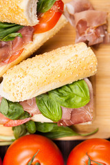 Close up of a home made sandwich on wooden board