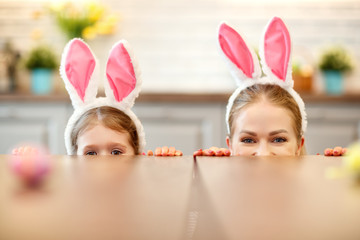 Happy easter!   happy family mother and daughter with hare ears