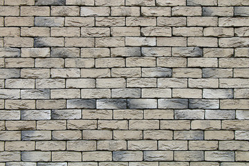 Fototapeta premium Texture from a fragment of a gray brick wall