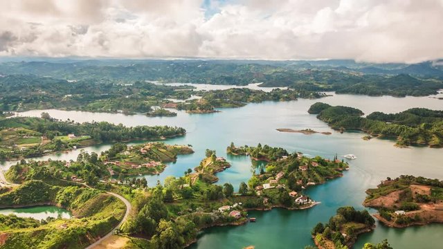 Medellin, Colombia, time lapse view of Guatape from the Rock (La Piedra del Penol) during daytime. Zoom out.