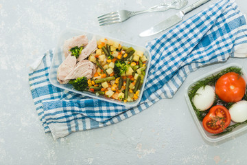 Variety of clean dieting dishes in containers. Healthy clean food concept, close up. Chicken meat with boiled vegetables.