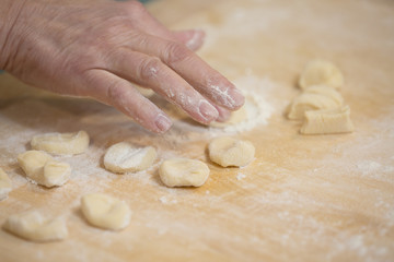 Dough made for modeling homemade ravioli, pelmeni or dumplings . Traditional Russian dish, national cuisine. Home cooking, handmade.