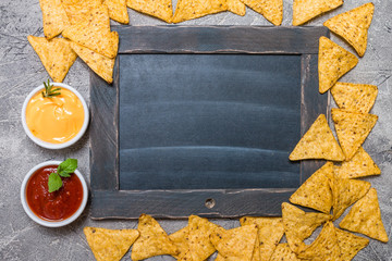 Mexican nacho with sauces and chalk board