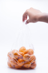 grab the oranges plastic bag from market