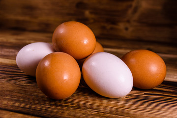 Boiled eggs on the old wooden table