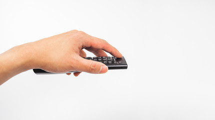Remote tv in hand holding, switching channels