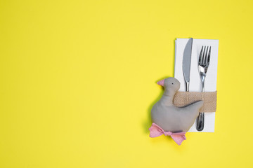 white napkin, knife and fork, place for dinner served in rustic style