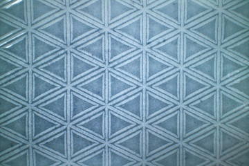 Decorative ceramic blue tile with figured pattern