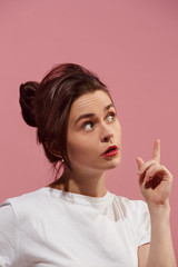 Obraz premium Young serious thoughtful business woman. Doubt concept.