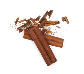 Cinnamon sticks with shavings isolated on white background, top view