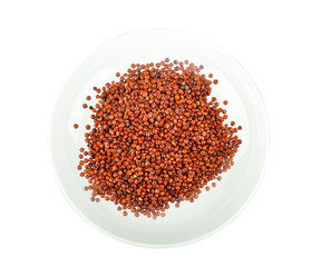 Red Quinoa seeds in white plate on white background