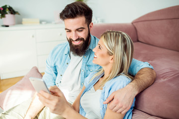 Fototapeta premium Couple enjoying at home