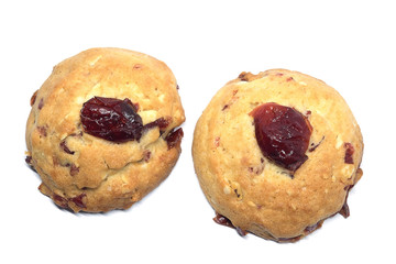 Cranberry cookie with part of cranberry on top  isolated on white background