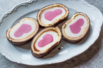 Heart Shaped Ice Cream Roll Cake with Vanilla and Chocolate.