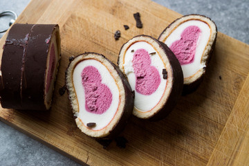 Heart Shaped Ice Cream Roll Cake with Vanilla and Chocolate.