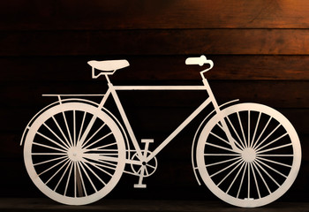 Fototapeta na wymiar The bike is on a wood background