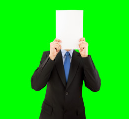 businessman covering his face