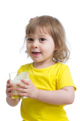 funny kid girl drinking yogurt or kefir