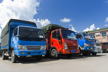 Fototapeta na wymiar Transport industry, trucks transporting goods parked in the parking lot