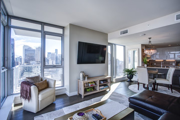 Light filled family room with panoramic view of Seattle