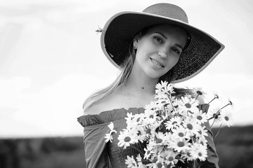Cute girl in a hat black and white